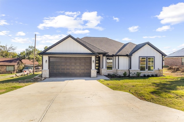 1621 S Chisholm Trl, Granbury, TX 76048 - modern inspired farmhouse with stone siding, an attached garage, driveway, a front lawn, and board and batten siding