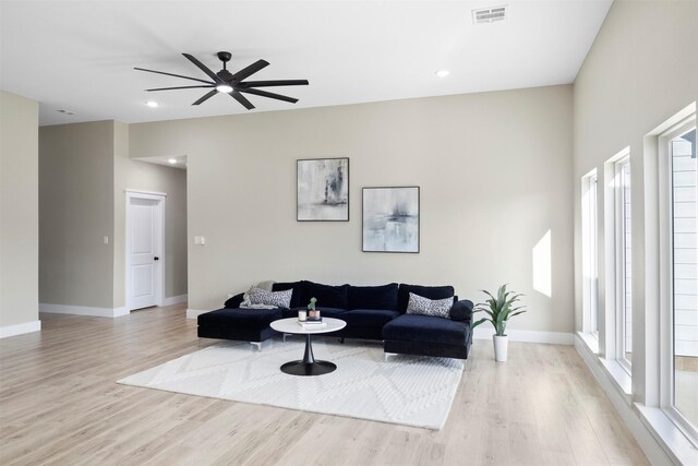 1621 S Chisholm Trl, Granbury, TX 76048 - living area with light wood-style floors, healthy amount of natural light, baseboards, and recessed lighting