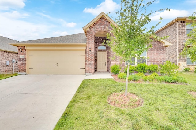 4311 Cordata Dr, Melissa, TX 75454 - view of front of home featuring brick siding, driveway, an attached garage, and a front lawn