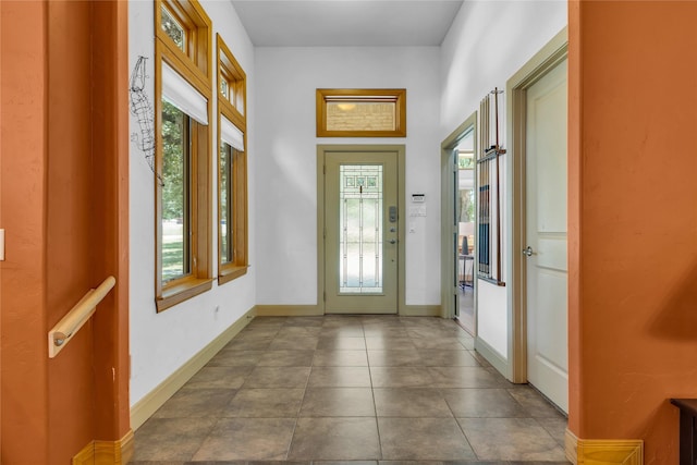 1212 Porter Rd, Bartonville, TX 75022 - doorway featuring baseboards and tile patterned floors