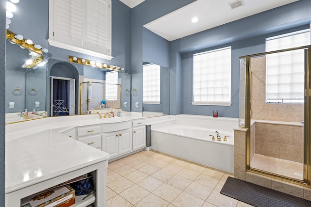 3804 Morning Dove Dr, Plano, TX 75025 - bathroom featuring a garden tub, vanity, a shower stall, tile patterned floors, and healthy amount of natural light