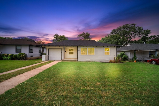 2415 Falls Dr, Dallas, TX 75211 - ranch-style home with a garage, driveway, and a yard