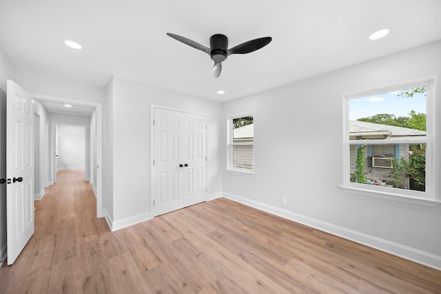 2415 Falls Dr, Dallas, TX 75211 - unfurnished bedroom with light wood finished floors, recessed lighting, baseboards, a closet, and ceiling fan
