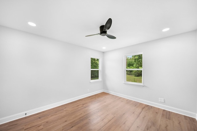 2415 Falls Dr, Dallas, TX 75211 - spare room featuring a ceiling fan, wood finished floors, baseboards, and recessed lighting