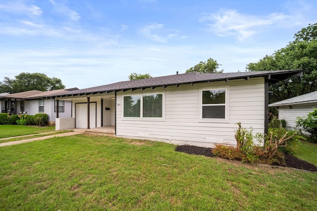 2415 Falls Dr, Dallas, TX 75211 - ranch-style house featuring a front lawn, a garage, and a shingled roof