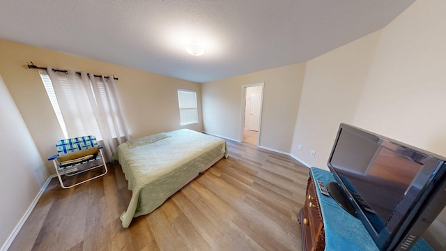 2008 Pine Knot Dr, Heartland, TX 75126 - bedroom featuring wood finished floors and baseboards