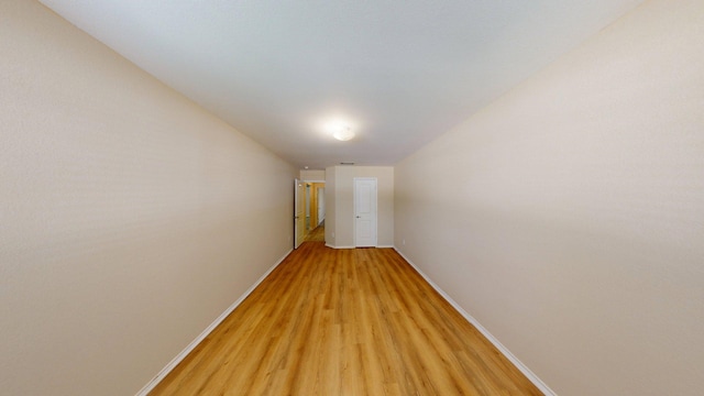 2008 Pine Knot Dr, Heartland, TX 75126 - hall featuring baseboards, light wood-type flooring, and vaulted ceiling