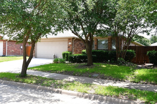 2008 Pine Knot Dr, Heartland, TX 75126 - obstructed view of property featuring a garage, concrete driveway, and brick siding