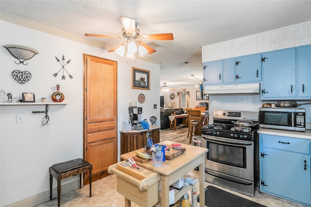 1055 Miller Rd, Reno, TX 76020 - kitchen with blue cabinets, appliances with stainless steel finishes, under cabinet range hood, a ceiling fan, and a textured ceiling