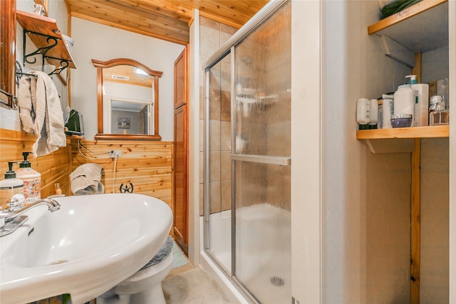 1055 Miller Rd, Reno, TX 76020 - full bathroom with a stall shower, a sink, wooden walls, and wood ceiling