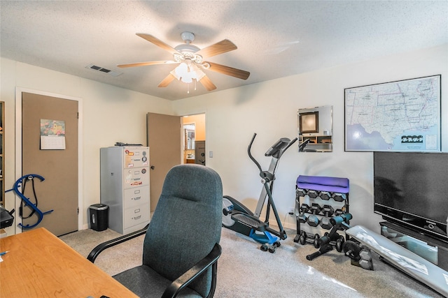 1055 Miller Rd, Reno, TX 76020 - office area featuring carpet flooring, ceiling fan, baseboards, and a textured ceiling
