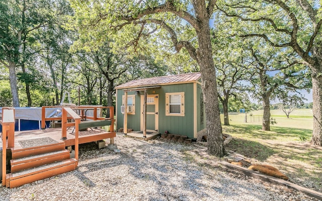 1055 Miller Rd, Reno, TX 76020 - view of outbuilding with view of wooded area