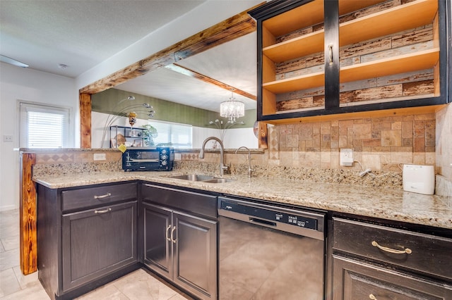 103 Presidents Way, Venus, TX 76084 - kitchen with dishwashing machine, a sink, open shelves, backsplash, and light stone countertops