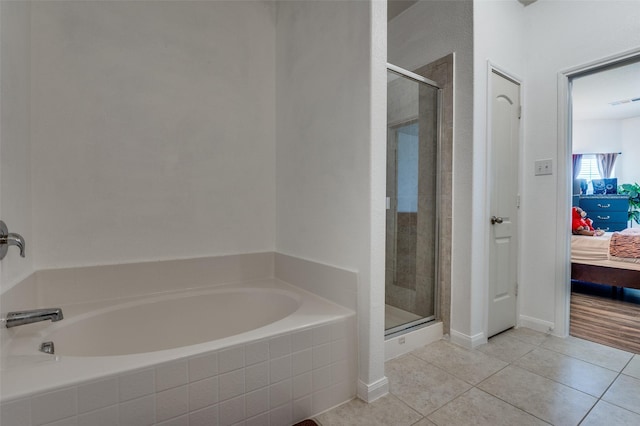 103 Presidents Way, Venus, TX 76084 - ensuite bathroom with a bath, a shower stall, and tile patterned floors