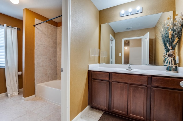 103 Presidents Way, Venus, TX 76084 - bathroom featuring tile patterned floors, vanity, washtub / shower combination, baseboards, and a textured wall