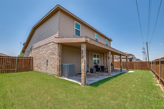 103 Presidents Way, Venus, TX 76084 - rear view of property featuring central air condition unit, a patio, and brick siding