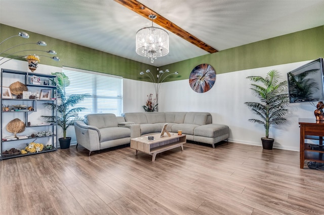 103 Presidents Way, Venus, TX 76084 - living area featuring a chandelier, wood finished floors, and beamed ceiling