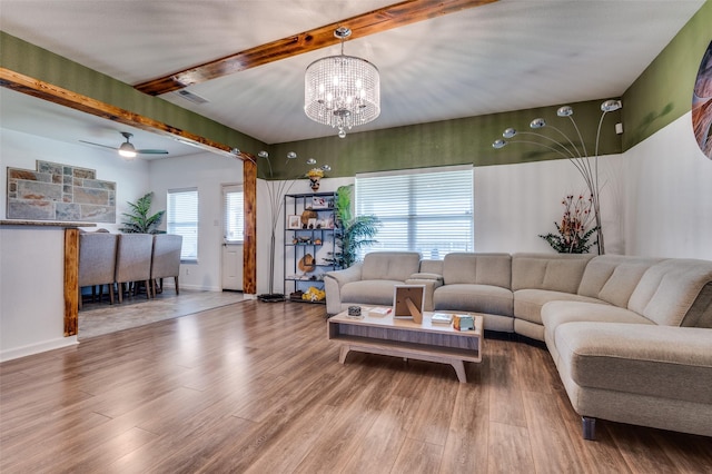 103 Presidents Way, Venus, TX 76084 - living area with beam ceiling, wood finished floors, a chandelier, a ceiling fan, and baseboards
