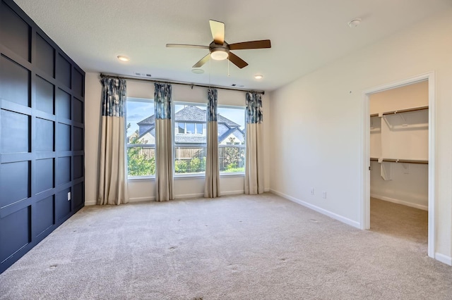 17204 Clover Dr, Celina, TX 75009 - unfurnished bedroom featuring carpet, baseboards, a walk in closet, recessed lighting, and a ceiling fan