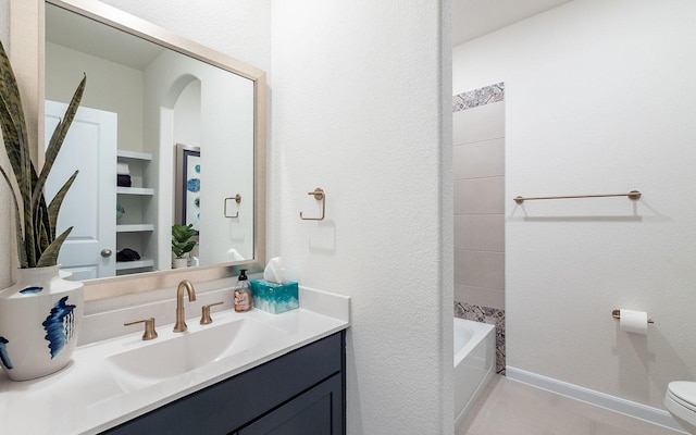 17204 Clover Dr, Celina, TX 75009 - bathroom featuring toilet, vanity, and shower / bathtub combination