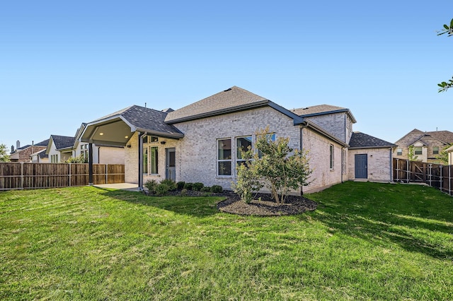 17204 Clover Dr, Celina, TX 75009 - back of house featuring brick siding and a shingled roof