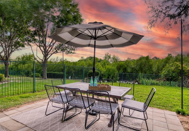 11471 Balcones Dr, Frisco, TX 75033 - patio terrace at dusk with outdoor dining area and a patio area