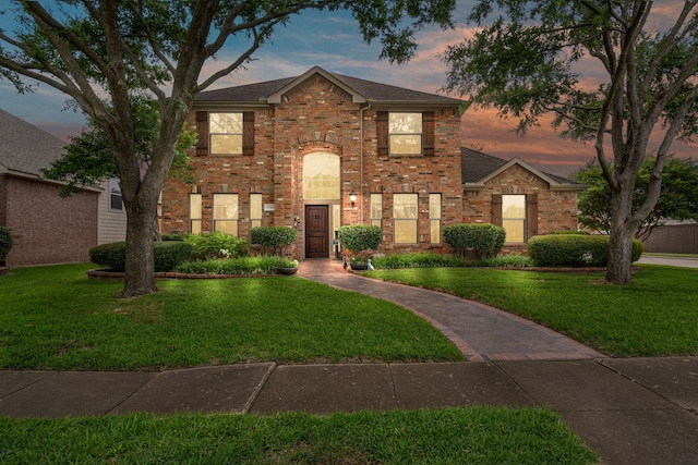 1702 Clarke Springs Dr, Allen, TX 75002 - traditional-style home featuring a yard, brick siding, and a shingled roof