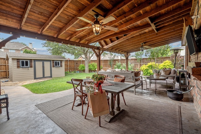 1702 Clarke Springs Dr, Allen, TX 75002 - fenced backyard featuring outdoor dining area, a ceiling fan, an outbuilding, and a patio