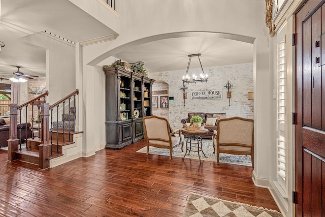 1702 Clarke Springs Dr, Allen, TX 75002 - entryway featuring a ceiling fan, arched walkways, stairs, hardwood / wood-style floors, and baseboards