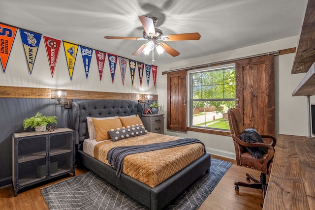 1702 Clarke Springs Dr, Allen, TX 75002 - bedroom featuring wood finished floors and a ceiling fan