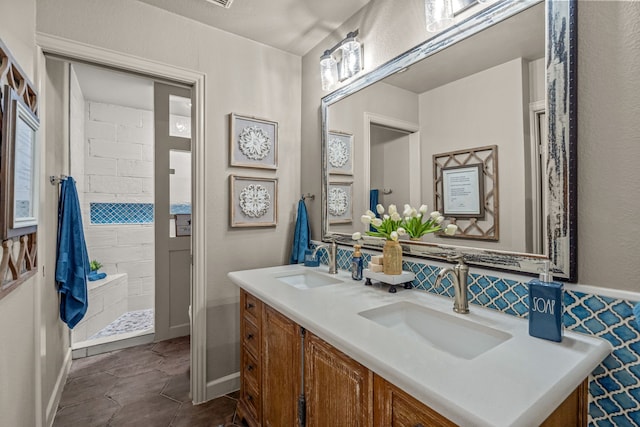 1702 Clarke Springs Dr, Allen, TX 75002 - bathroom featuring double vanity, tiled shower, and tile patterned flooring