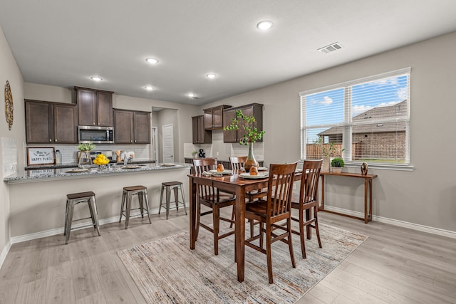 1601 Bennington Ln, Celina, TX 75009 - dining room featuring light wood-style floors, recessed lighting, and baseboards