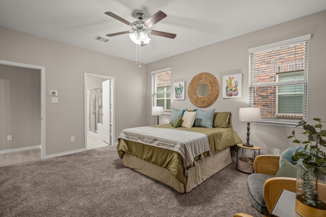 1601 Bennington Ln, Celina, TX 75009 - carpeted bedroom with baseboards, ceiling fan, and connected bathroom