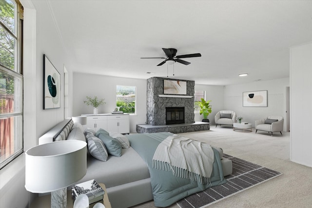 3622 Emerald Dr, Mesquite, TX 75150 - carpeted living room featuring ceiling fan and a fireplace