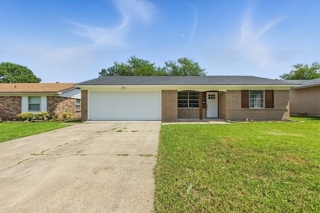 3622 Emerald Dr, Mesquite, TX 75150 - ranch-style home with brick siding, an attached garage, concrete driveway, and a front yard