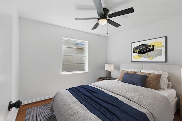 3622 Emerald Dr, Mesquite, TX 75150 - bedroom with wood finished floors and ceiling fan