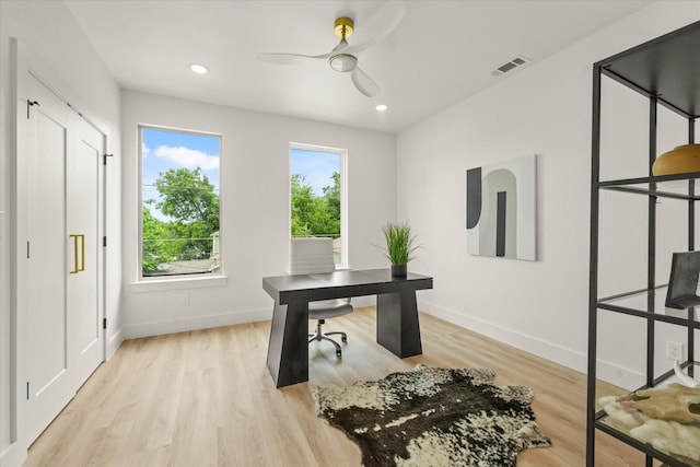 1344 Compton St, Dallas, TX 75203 - home office featuring ceiling fan, baseboards, light wood-type flooring, and recessed lighting