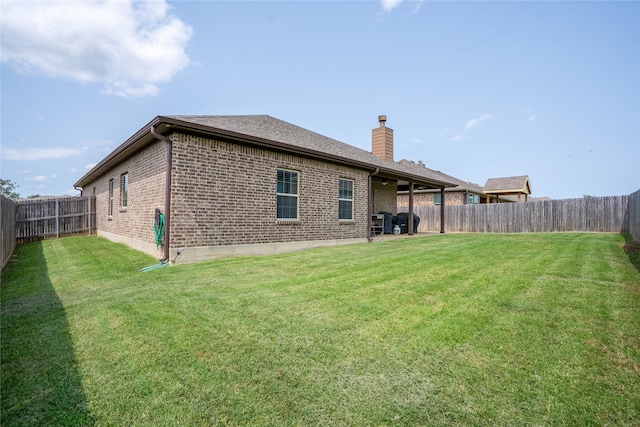 4905 Lakepark Dr, Sanger, TX 76266 - rear view of property with brick siding and a chimney