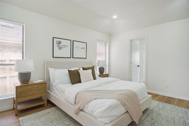 6420 Green Ridge Dr, Watauga, TX 76148 - bedroom featuring wood finished floors and baseboards