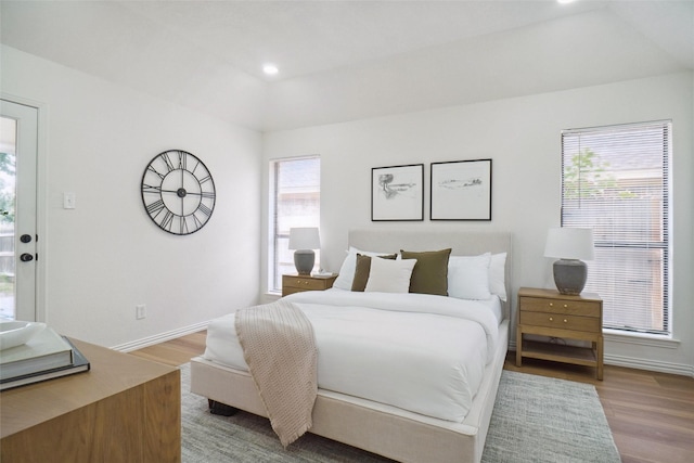 6420 Green Ridge Dr, Watauga, TX 76148 - bedroom with wood finished floors, baseboards, and recessed lighting
