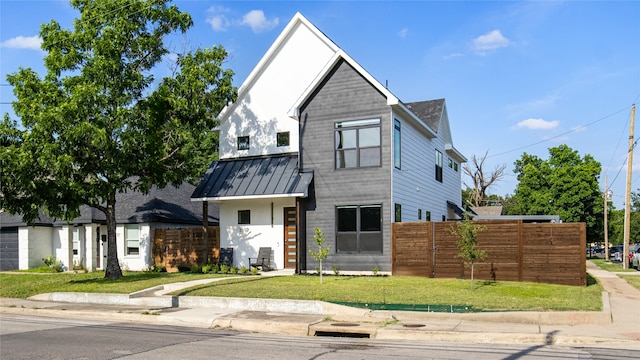 3502 Vilbig Rd, Dallas, TX 75212 - view of front facade with a standing seam roof, metal roof, and stucco siding