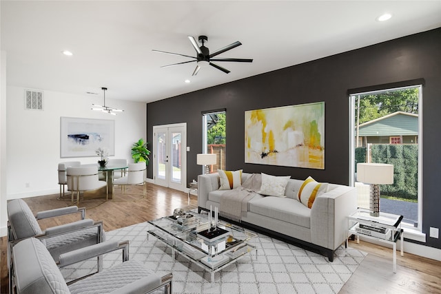 3502 Vilbig Rd, Dallas, TX 75212 - living area with light wood-type flooring, french doors, recessed lighting, baseboards, and ceiling fan