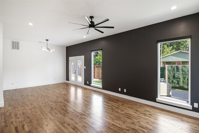 3502 Vilbig Rd, Dallas, TX 75212 - spare room with plenty of natural light, wood finished floors, french doors, and recessed lighting