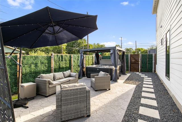 3502 Vilbig Rd, Dallas, TX 75212 - fenced backyard featuring an outdoor living space, a hot tub, and a patio