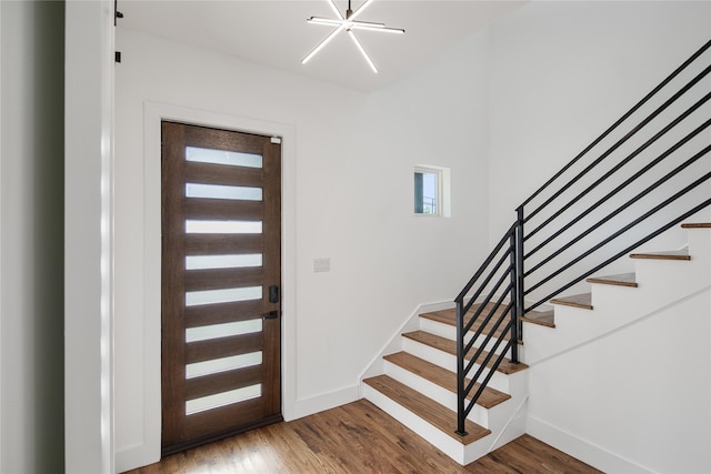 3502 Vilbig Rd, Dallas, TX 75212 - entryway with stairs, baseboards, and wood finished floors