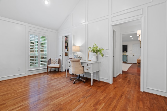 10007 Silver Creek Rd, Dallas, TX 75243 - office featuring a decorative wall, light wood finished floors, and lofted ceiling