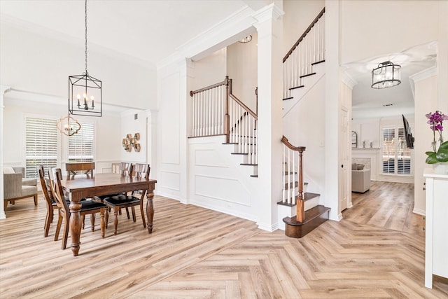 4804 Arbor Glen Dr, Mckinney, TX 75072 - dining space with crown molding, stairs, healthy amount of natural light, a chandelier, and a high ceiling