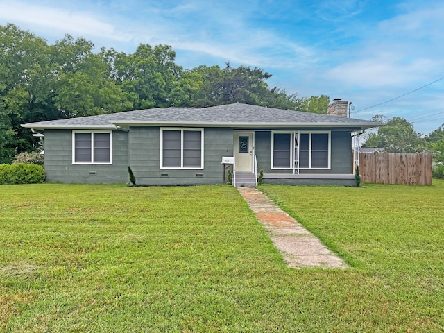 910 N Mill St, Bowie, TX 76230 - view of front of house featuring a chimney and a shingled roof
