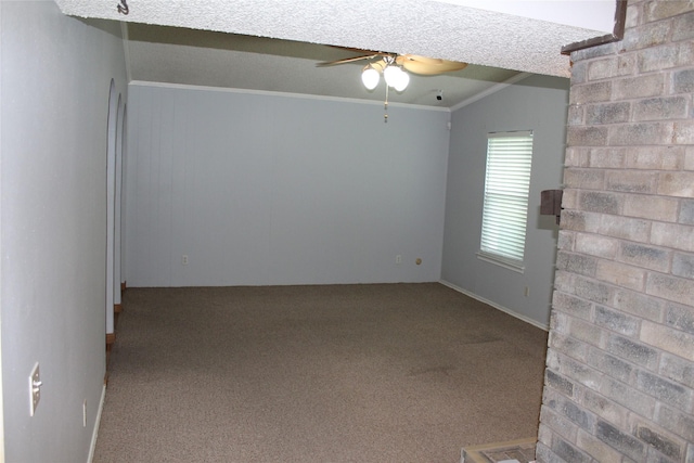 1424 Valley Trl, Mesquite, TX 75149 - spare room featuring a ceiling fan, carpet floors, crown molding, and a textured ceiling