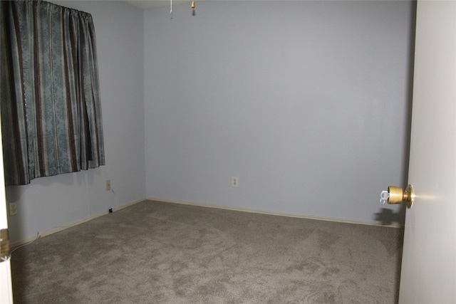 1424 Valley Trl, Mesquite, TX 75149 - spare room featuring carpet flooring